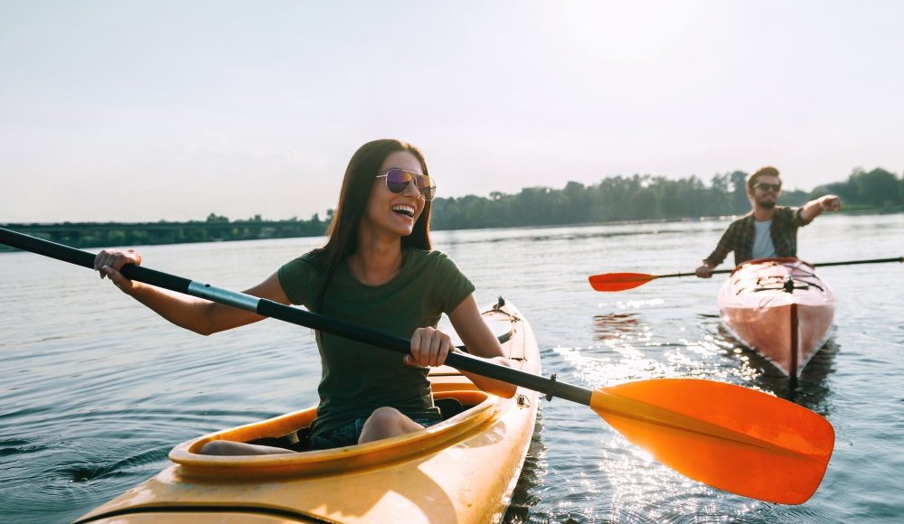 Couple kayaking and enjoying the great outdoors