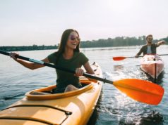 The 5 Best Products for the Outdoorsy Couple Couple kayaking and enjoying the great outdoors